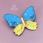 Farfalla elegante azzurra e gialla