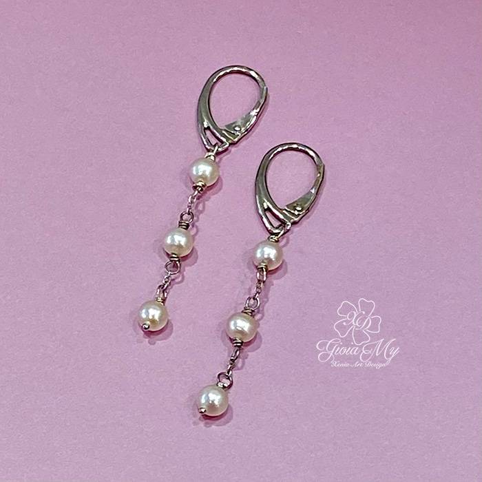 Orecchini artigianali in argento con perle naturali