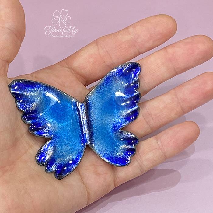 farfalla fatta a mano blu