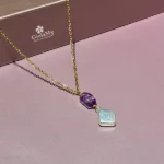 Ciondolo cristalloterapia con fluorite e perla barocca naturale