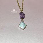 Ciondolo particolare con fluorite e perla naturale barocca