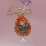 Ciondolo artigianale in raku rossa e oro