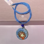 Idea regalo donna collana Raku con lapislazzuli fiore rosso bluIdea regalo donna collana Raku con lapislazzuli fiore rosso blu